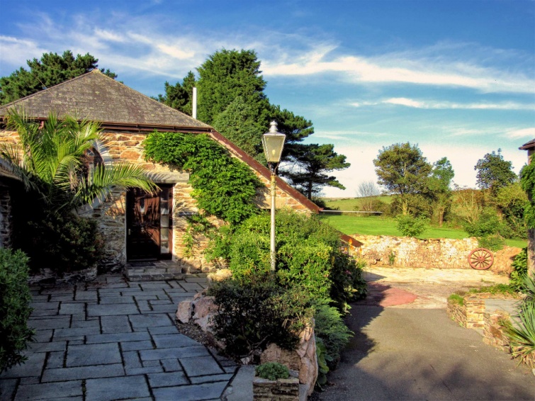 Looking from the Courtyard to the Large Gardens of Hendra Paul Holiday Cottages Cornwall