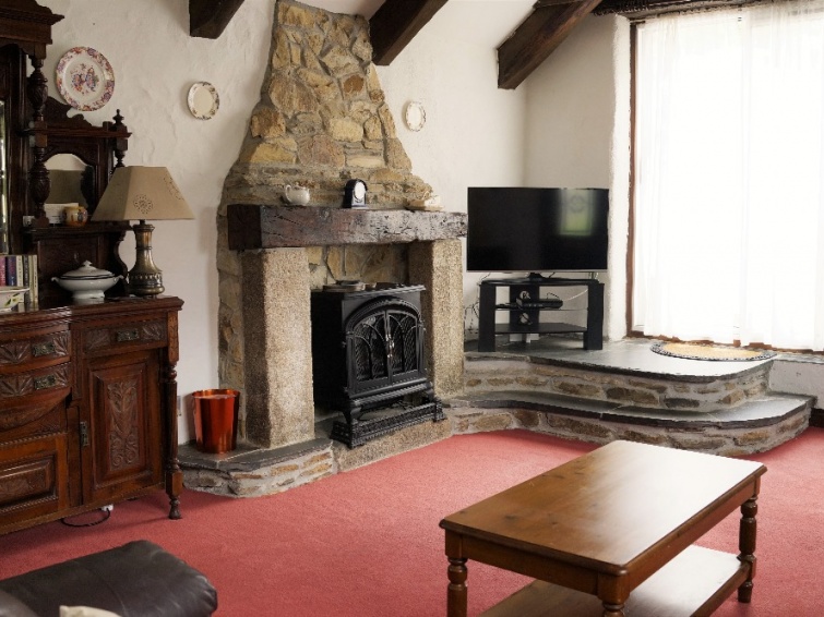 Traditional Stone Fireplace in Badgers Sett Holiday Cottage Cornwall